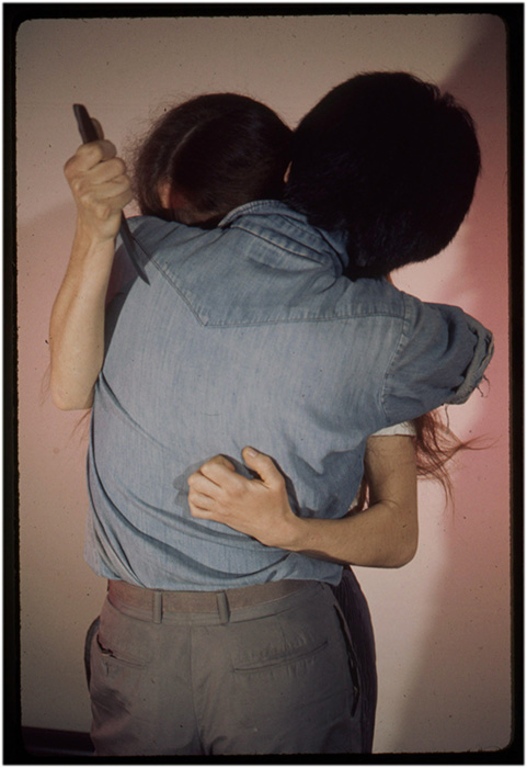 Murder reenactment with steak knife by Annastacia McDonald and Paul Wong from the Murder Research files, c. 1976, Courtesy of Paul Wong