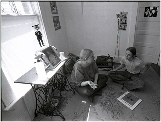 Marlene MacGregor sitting with Kenneth Fletcher at 26th and Main, with Mr. Fischer in the window, c. 1974, Courtesy of Kazumi Tanaka